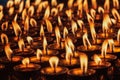Burning candles in Buddhist temple Royalty Free Stock Photo