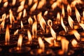 Burning candles in Buddhist temple Royalty Free Stock Photo