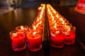 Burning candles at a Buddhist temple,Lighting of Praying candles Royalty Free Stock Photo