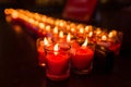 Burning candles at a Buddhist temple,Lighting of Praying candles Royalty Free Stock Photo