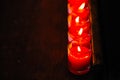 Burning candles at a Buddhist temple,Lighting of Praying candles Royalty Free Stock Photo