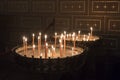 Burning candles in catholic church. Royalty Free Stock Photo