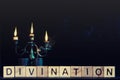 Burning candles on a dark background and the inscription`` divination``, Occult, esoteric, magic concept background