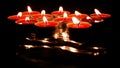 Burning candles on the dark background. Mystique atmosphere