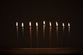 Burning candles in the dark. Hanukkah holiday Royalty Free Stock Photo