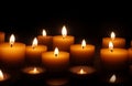 Burning candles in the dark night for a concept Royalty Free Stock Photo