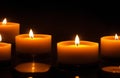 Burning candles in the dark night for a concept Royalty Free Stock Photo