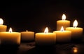 Burning candles in the dark night for a concept Royalty Free Stock Photo