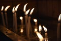 Burning candles over black background Royalty Free Stock Photo