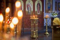 The burning candles for a prayer in Orthodox church
