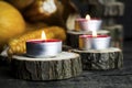 Burning Candles With Pumpkins, Corncob, autumn leaves in the background. Thanksgiving Day, Decoration on a wooden table Royalty Free Stock Photo