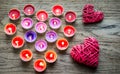 Burning candles with retro cane hearts Royalty Free Stock Photo