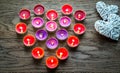 Burning candles with retro cane hearts Royalty Free Stock Photo