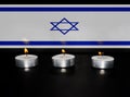 Burning candles with Semi Transparent Flag of Israel background. Photo for Israel Memorial Day, Holocaust Remembrance Day