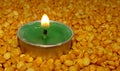 Burning candles Split pea ,Candles on Split pea background,Green candles on the seeds, Royalty Free Stock Photo