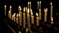 Burning candles standing on candlesticks in the church