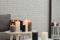 Burning candles on tables Royalty Free Stock Photo