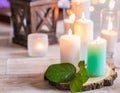 Burning candles in transparent glass vases