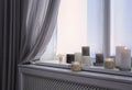 Burning candles on window sill Royalty Free Stock Photo