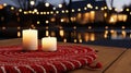 Burning candles on wooden table near swimming pool at night. Space for text Royalty Free Stock Photo