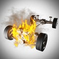 Burning car chassis with engine and wheels