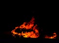 Burning car on the road at night, a tragic accident ending with Royalty Free Stock Photo