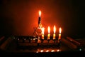 Burning Chanukiah. Fourth day of Hanukkah