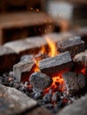 Burning charcoal with glowing embers and flames. Royalty Free Stock Photo