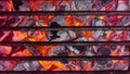 Burning charcoals background. Close-up of a hot charcoals lying in a barbeque grill. Royalty Free Stock Photo