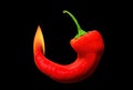 Burning chilli pepper isolated on black background Royalty Free Stock Photo