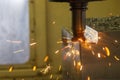 The burning chip from wear cutting tools on CNC milling machine