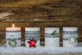 Christmas candles decorated with ornaments for Advent Season