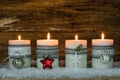 Christmas candles decorated with ornaments for Advent Season