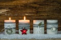 Christmas candles decorated with ornaments for Advent Season