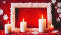 burning christmas candles with white frame and snowflakes on red background Royalty Free Stock Photo