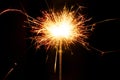 Burning Christmas sparkler on black background Royalty Free Stock Photo