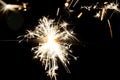 Burning christmas sparkler isolated on black background Royalty Free Stock Photo