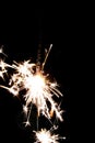 Burning christmas sparkler isolated on black background Royalty Free Stock Photo