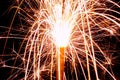 Burning christmas sparklers with long exposure. Beautiful sparkler firework flame on black background. Blurred lights of firework. Royalty Free Stock Photo