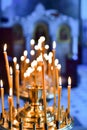 Burning church candles for worshiping God in the temple Royalty Free Stock Photo