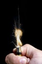 Burning cigarette lighter Royalty Free Stock Photo