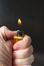 Burning cigarette lighter Royalty Free Stock Photo