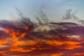 Burning clouds in the sky at sunset Royalty Free Stock Photo