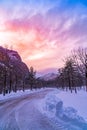 Burning clouds in sky at sunset, winter road in Pyrenees of Spain Royalty Free Stock Photo