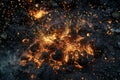 Burning coals on the black ground,  Close-up Royalty Free Stock Photo