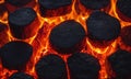 Burning coals in a fireplace, close-up. Background Royalty Free Stock Photo