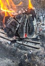 Burning coals, wood and ashes in the hot oven Royalty Free Stock Photo