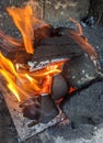 Burning coals, wood and ashes in the hot oven Royalty Free Stock Photo