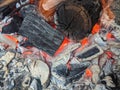 Burning coals, wood and ashes in the hot oven Royalty Free Stock Photo