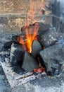 Burning coals, wood and ashes in the hot oven Royalty Free Stock Photo